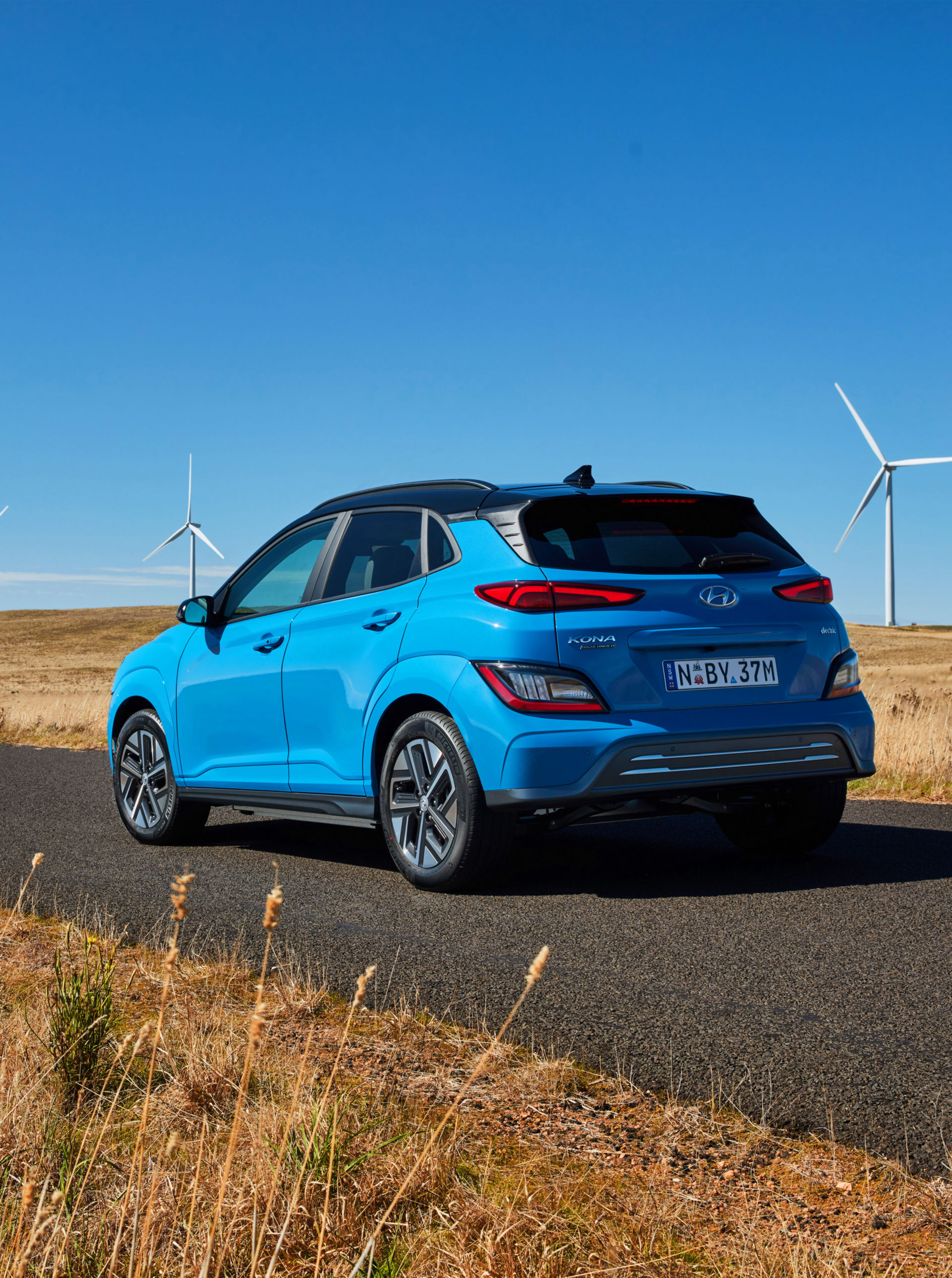 Download 2021 Hyundai Kona Electric - Rear Three-Quarter HD Phone Wallpaper 1920x2576 #11