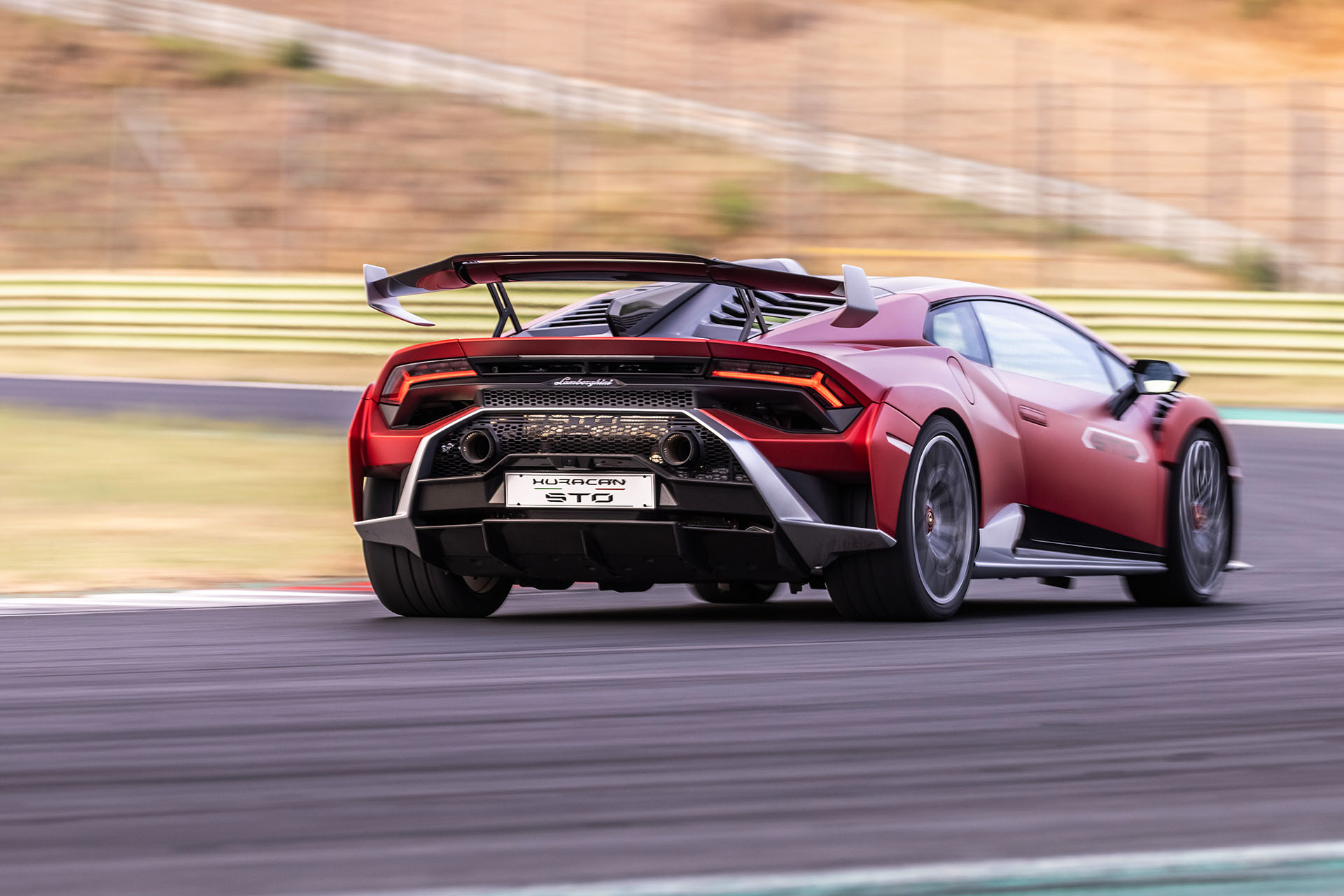 Download 2021 Lamborghini Huracán STO - Rear Three-Quarter HD Wallpaper 1920x1280 #25