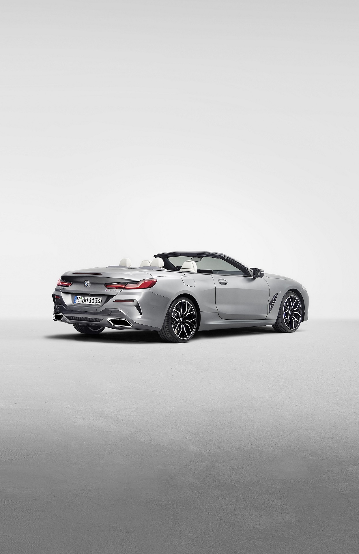 Download 2023 BMW M850i xDrive Convertible - Rear Three-Quarter HD Phone Wallpaper 1244x1920 #17