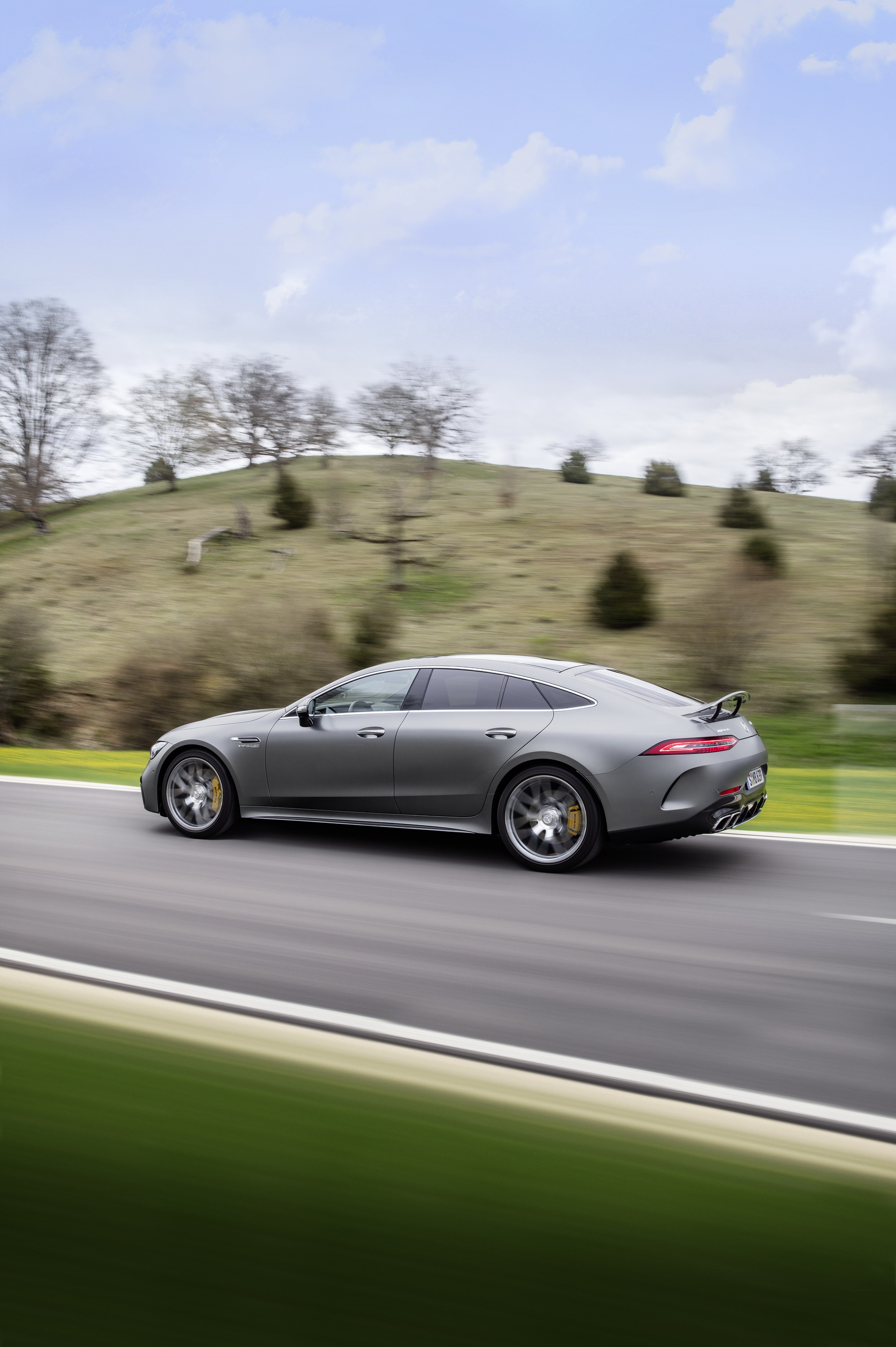 Download 2023 Mercedes-AMG GT 63 S 4-Door Coupe - Rear Three-Quarter HD Phone Wallpaper 1920x2886 #8