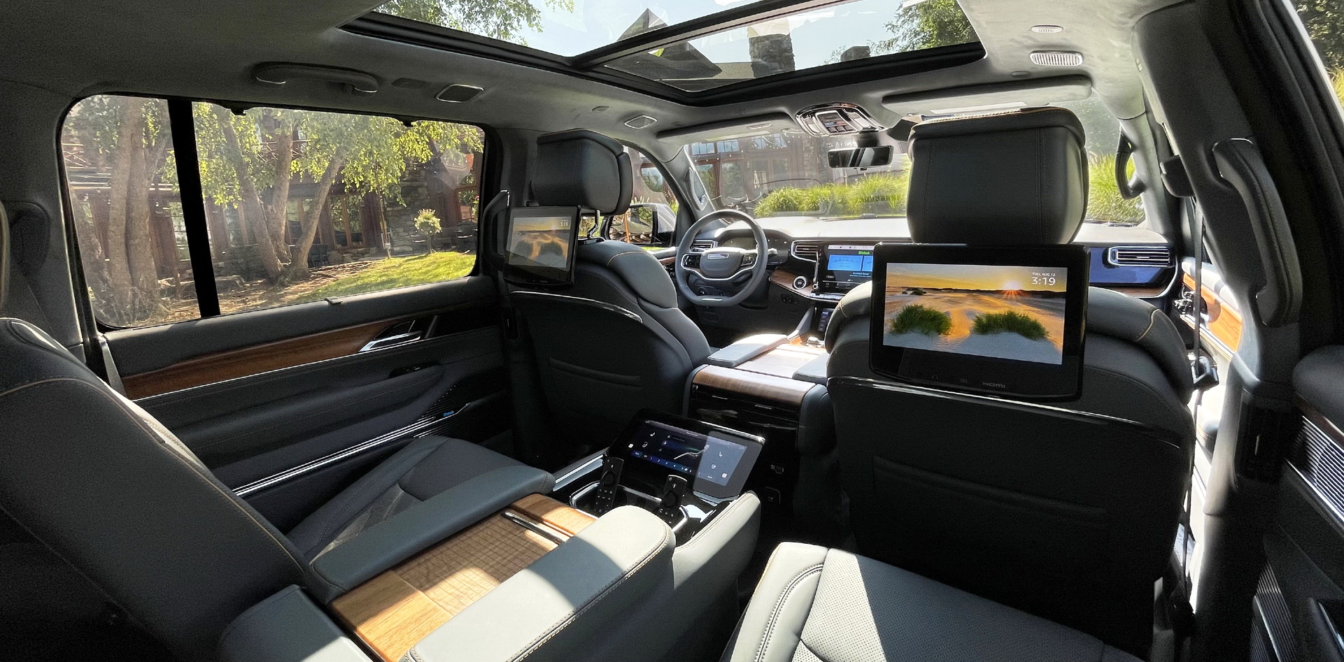 Download 2023 Jeep Grand Wagoneer L - Rear Seat Entertainment System HD Wallpaper 1921x947 #145