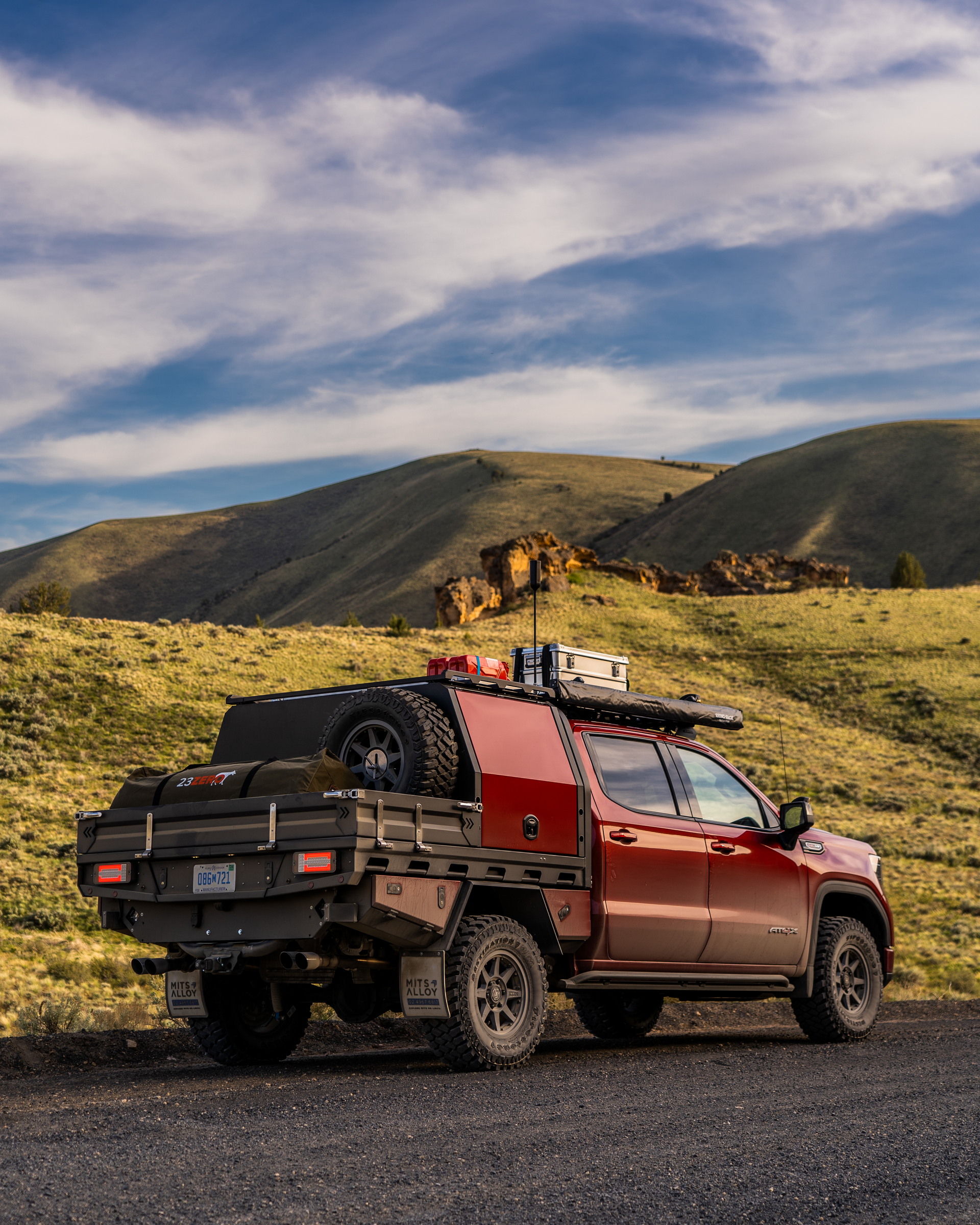 Download 2022 GMC Sierra 1500 AT4X Ultimate Overland Vehicle - Rear Three-Quarter HD Phone Wallpaper 1920x2400 #7