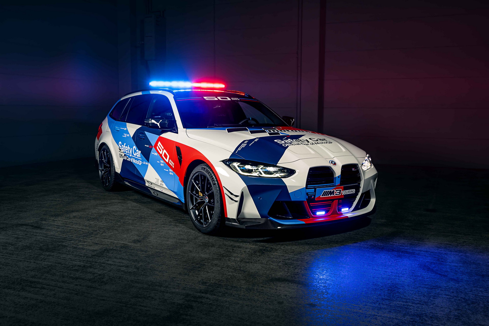 Download 2023 BMW M3 Touring MotoGP Safety Car - Front Three-Quarter HD Wallpaper 1920x1280 #1