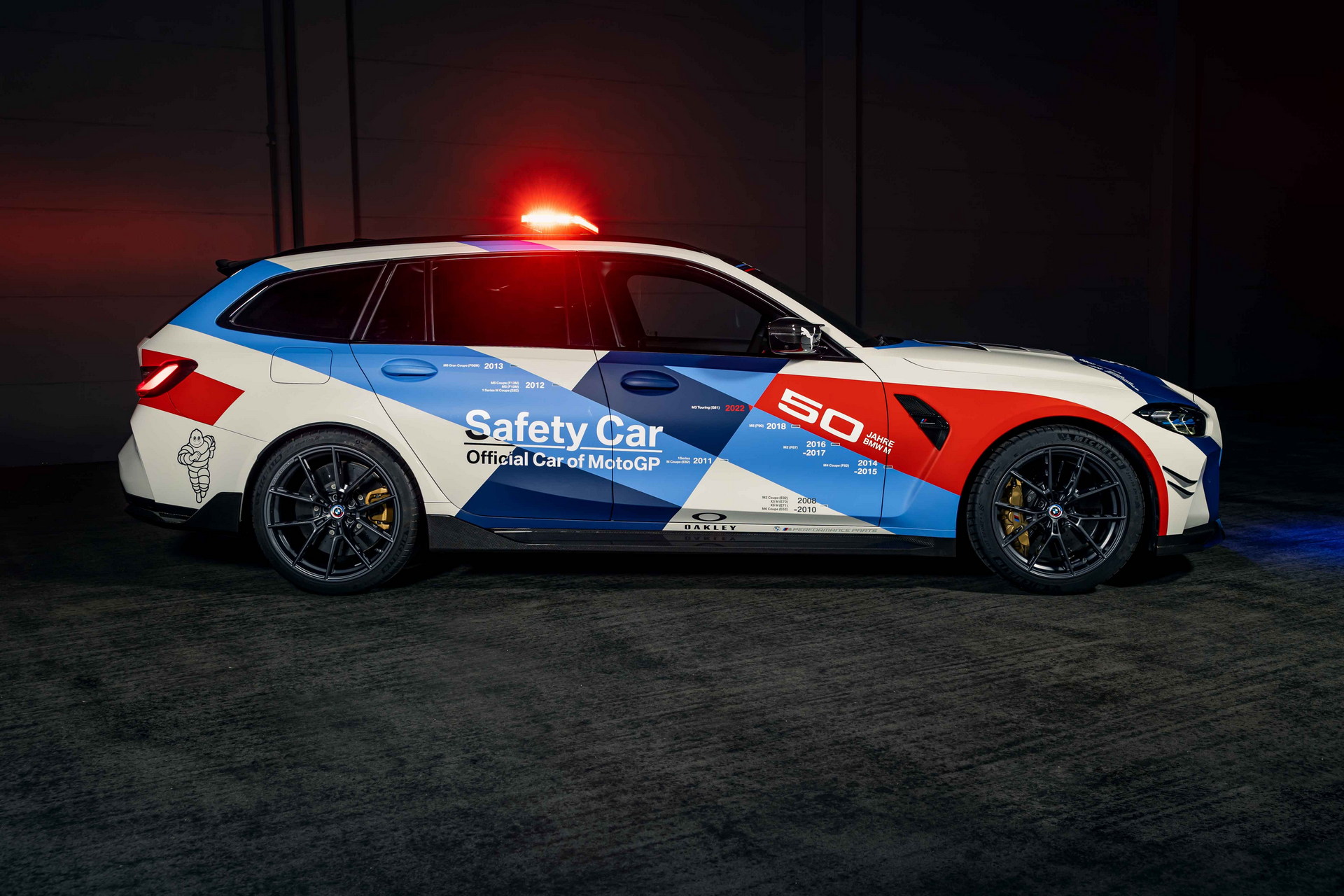 Download 2023 BMW M3 Touring MotoGP Safety Car - Side HD Wallpaper 1920x1280 #6