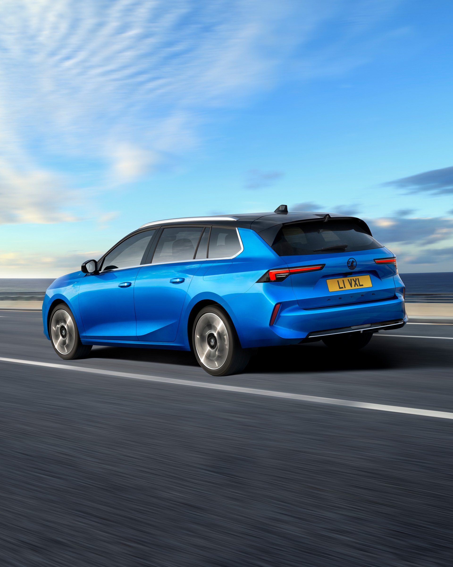 Download 2022 Vauxhall Astra Sports Tourer - Rear Three-Quarter HD Phone Wallpaper 1920x2400 #5